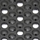 Drain-thru anti-fatigue mat in wet industrial area